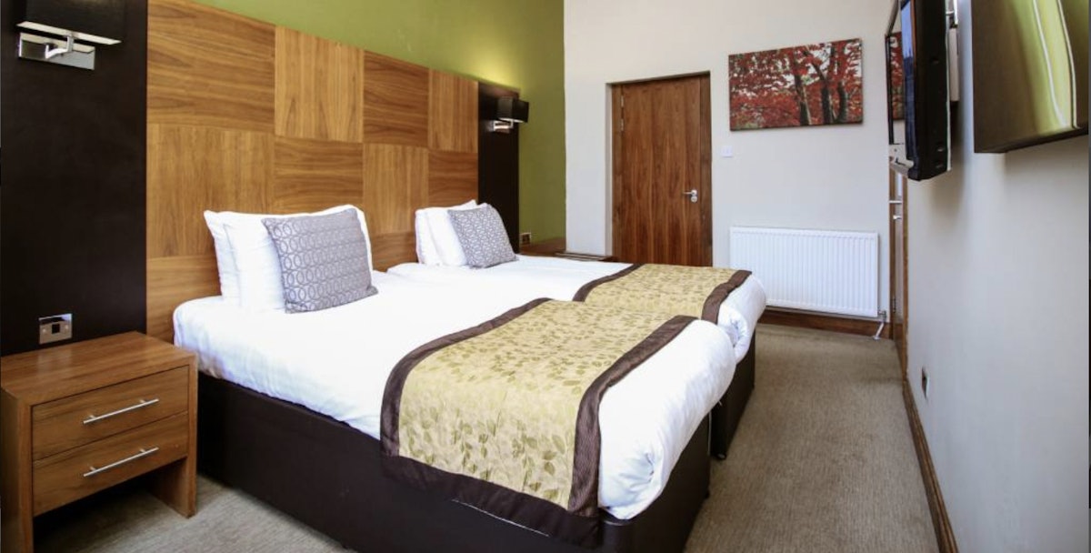 Book a stay at Acorn Hotel