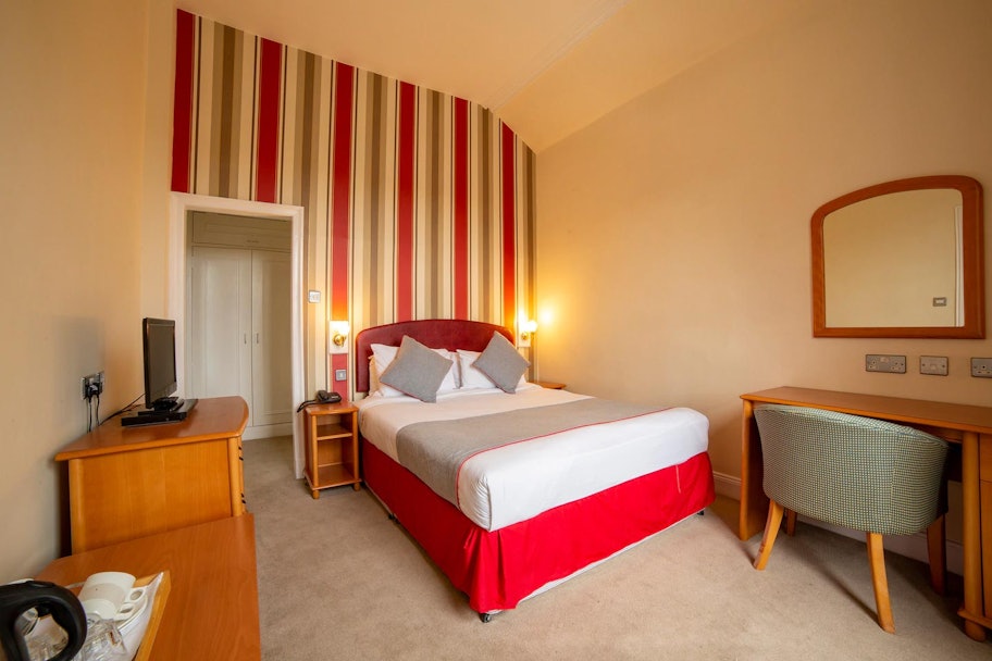 Book a stay at Redstones Hotel