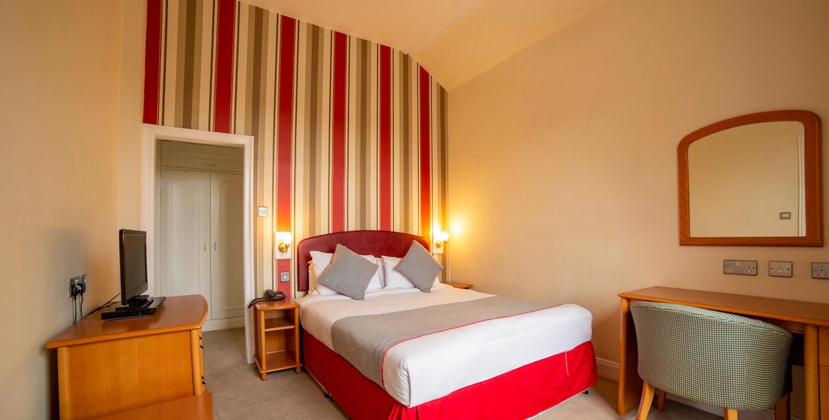 Book a stay at Redstones Hotel